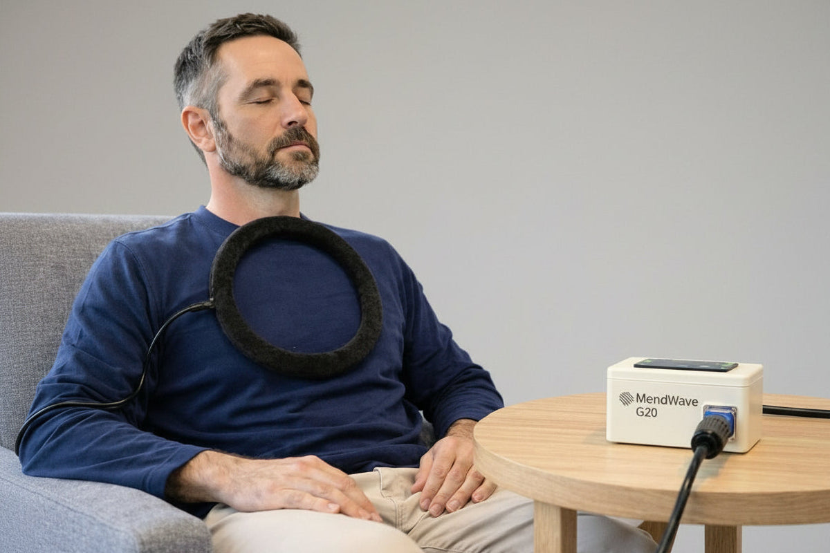 Man using PEMF device for recovery